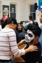 Student having his face painted